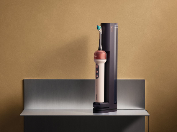Photo of the Dyson toothbrush on a shelf.