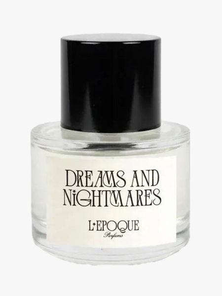 Clear bottle of L’Epoque Parfums Dreams and Nightmares Eau de Parfum with black cap on light gray background