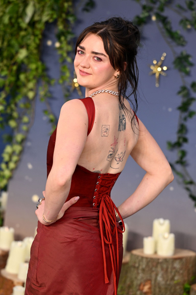 Image may contain Euphemia Chalmers Gray Adult Person Face Happy Head Smile Black Hair Hair Skin and Tattoo